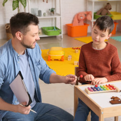 boy and a man talking