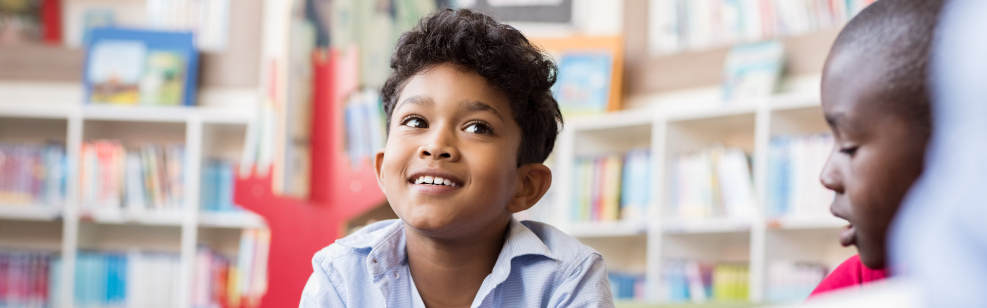young boy listening story