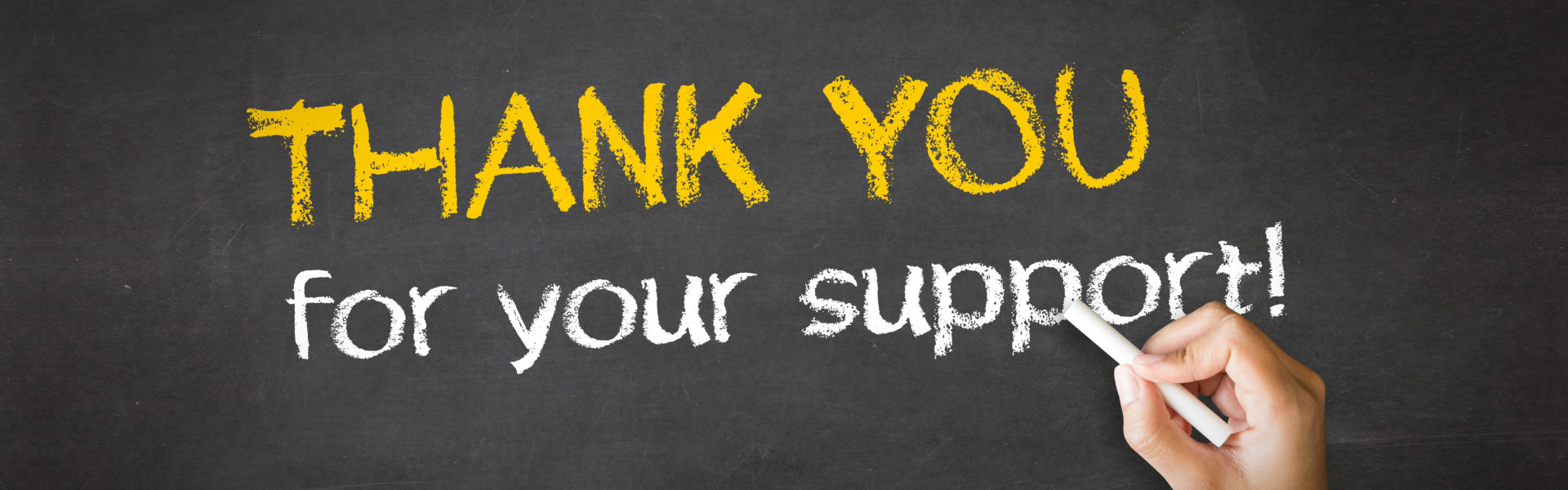 a hand writing thank you for your support on black board